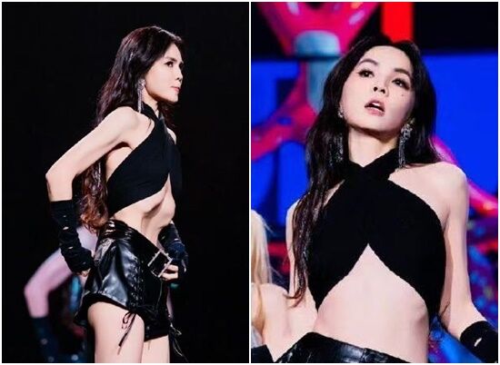 Ella在舞台上示範高難度「真空滾胃」。（圖／翻攝微博）