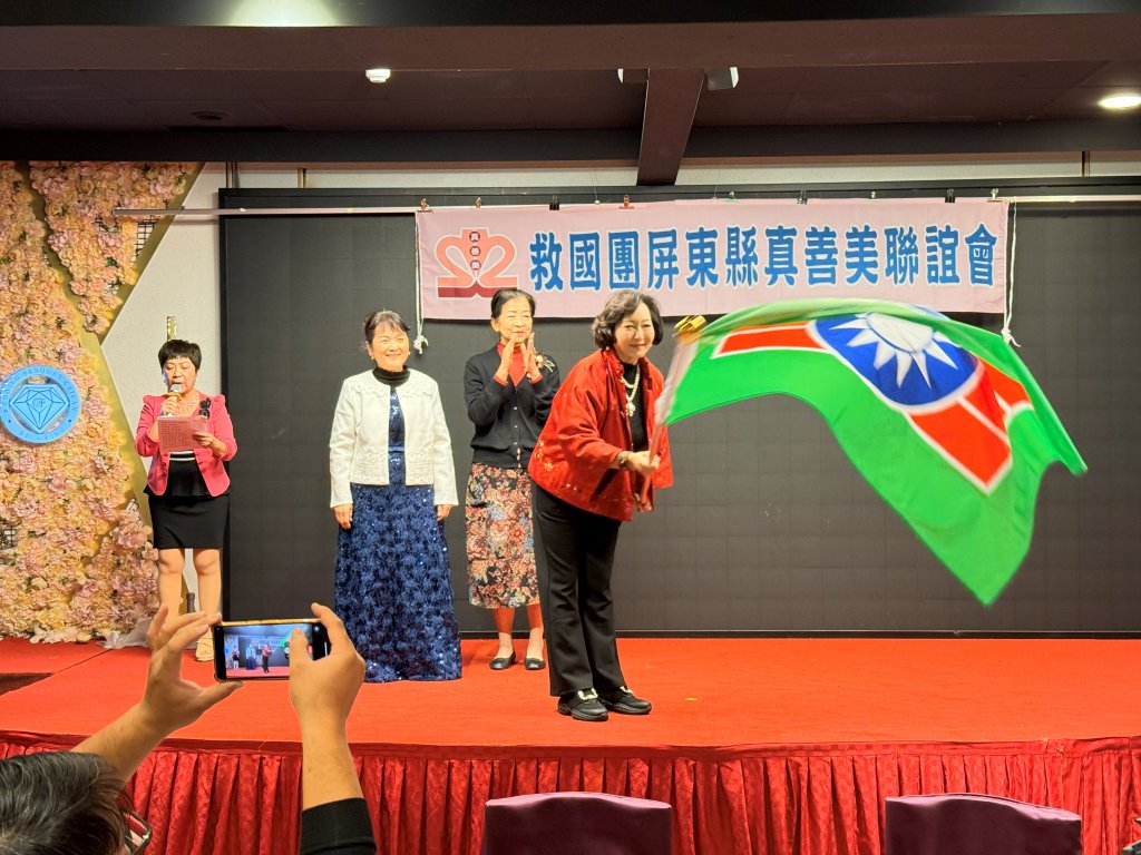 一面會旗的重量，撐起整座城市的溫柔